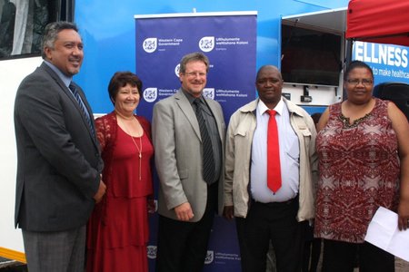 Fltr: Overberg District Director Education, Mr Bertram Loriston, Overberg District Director Health, Ms Wilhelmina Kamfer, Western Cape Minister of Health, Mr Theuns Botha, Theewaterskloof Deputy Mayor, Cllr Mlulami Tshaka and the Principal of Umyezo Wama Apile Combined School, Ms Gladys Badela, outside the Wellness Mobile.